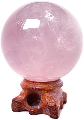 Кино кристална кварц сфера со дрво стои природен кристален лекување минерална loveубов, камена топка дивинација скулптура скулптура фигура