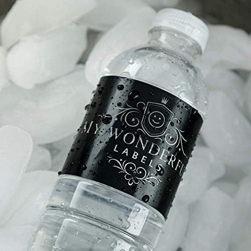 100 сребрени конфети што паѓаат на црна позадина годишнината од свадбата за невестински шише со шише со вода за туширање