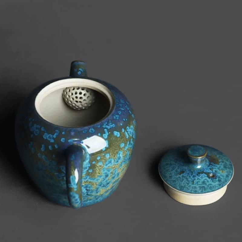 Кинески рачен чајник со кинески рачен чај со капење текстура на текстура на чај од чај од чај